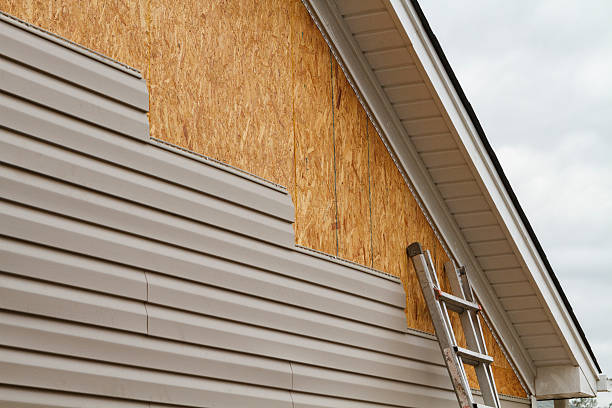 Professional Emergency Siding Repair technician working in West Columbia, TX
